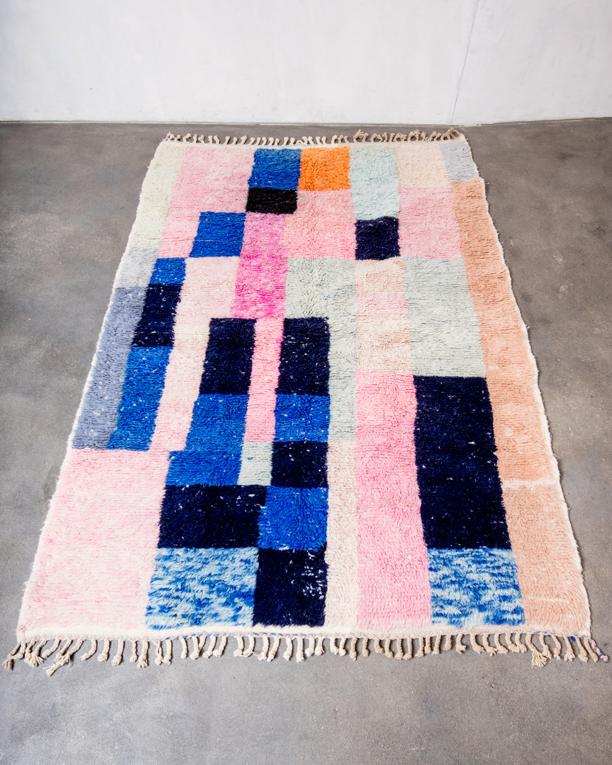 Modern, designer, handcrafted Berber rug from Morocco. Beniourain carpet with beautiful colours and patterns and fluffy wool texture.